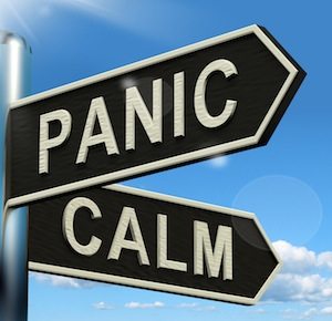 Panic Or Calm Signpost Showing Chaos Relaxation And Rest
